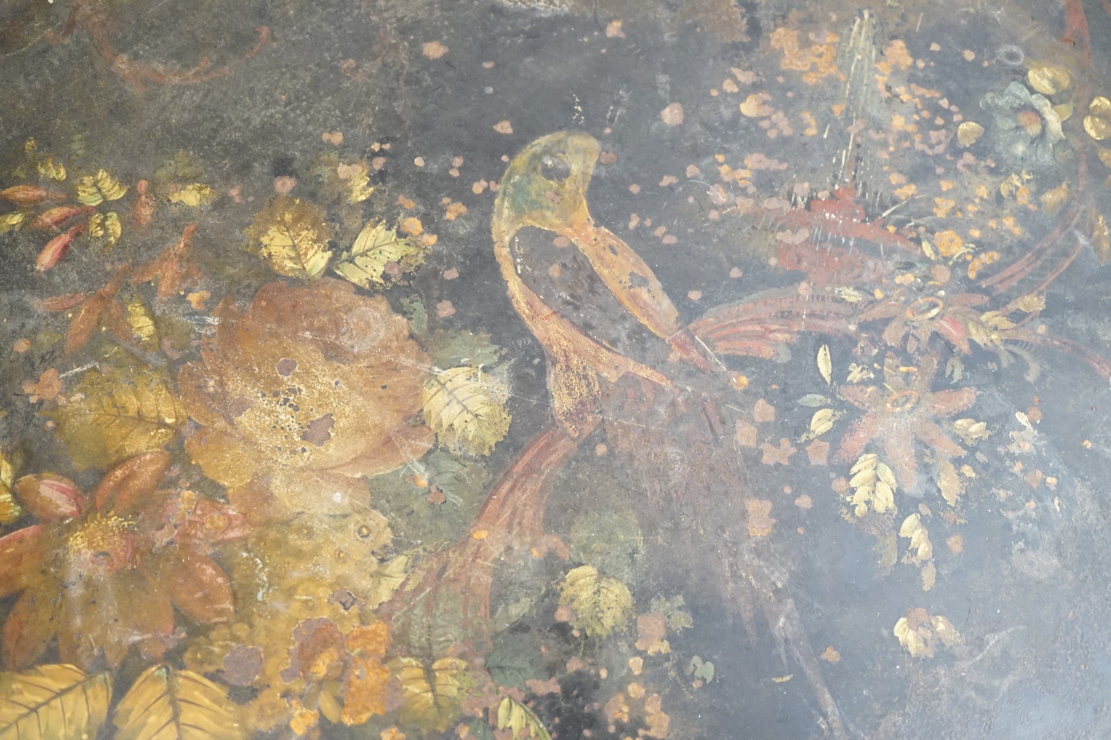 A Victorian painted iron tray with parrot and flower decoration. 82cm wide